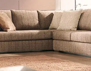 Upholstered sectional sofa cleaned by a professional upholstery cleaner